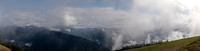 Panoramic Mountain Landscape with Clouds and Mist