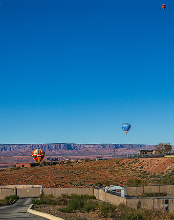 Hot Air Balloons Over Desert Landscape