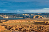 Desert Landscape with Water and Geological Formations