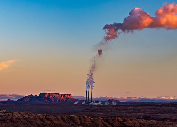 Industrial Smokestacks at Sunrise