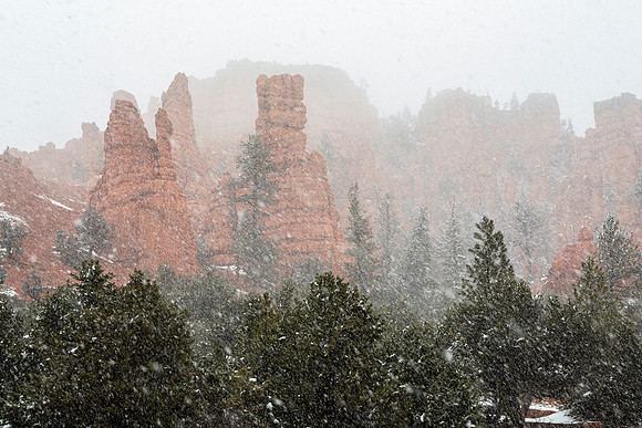 Winter Snowfall on Red Rock Formations