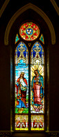 Religious Stained Glass Window with Figures