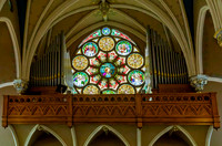 Stained Glass Window and Pipe Organ in Church