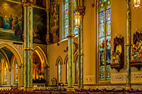 Church Interior with Stained Glass and Religious Art
