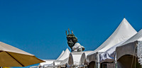 Head of Neptune Statue Above Tents