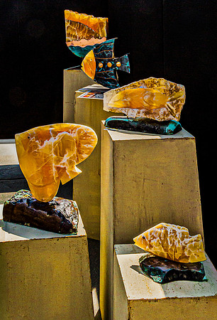 Fish-Shaped Sculptures and Abstract Art Display