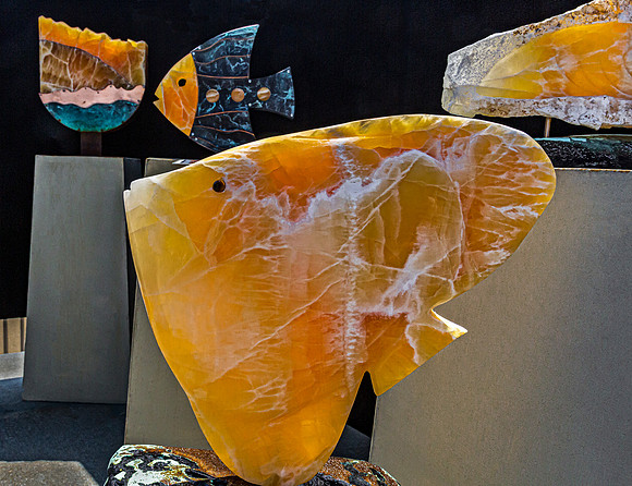 Stone and Metal Fish Sculptures