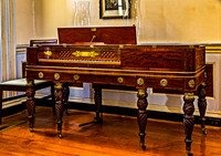 Antique Wooden Piano with Ornate Details