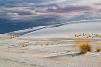 White Sand Dunes Under Cloudy Sky