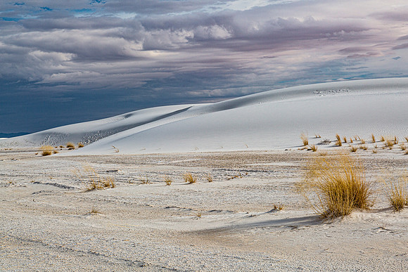 White Sand Dunes Under Cloudy Sky