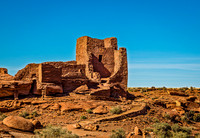 Ancient Wupatki Pueblo Ruins Against Blue Sky
