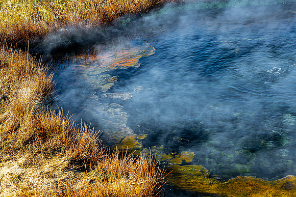 Steaming Hot Spring with Mineral Deposits