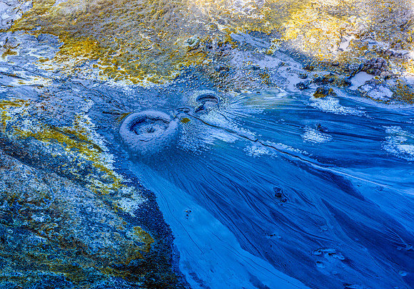 Abstract Volcanic Mud Pools with Blue and Yellow Minerals