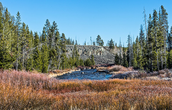 Sheer Basalt Columns and River Landscape