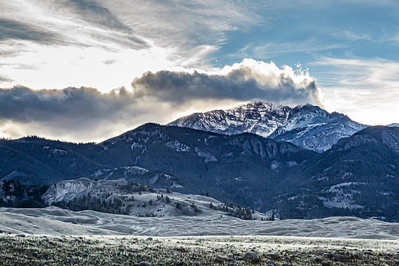 Snow-capped Mountains and Frosted Fields