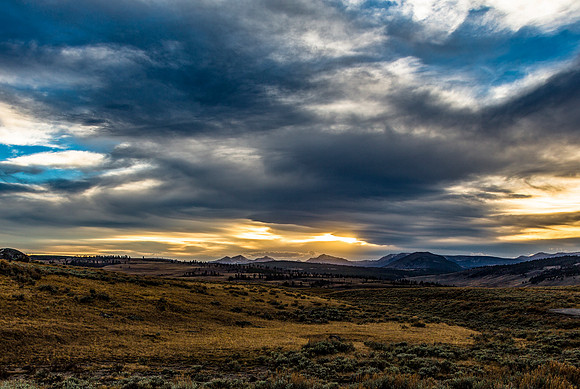 Dramatic Sunset over Vast Landscape