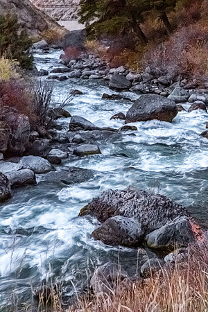Fast-Flowing River with Rocks and Rapids