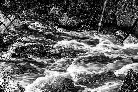Fast-flowing River in Black and White