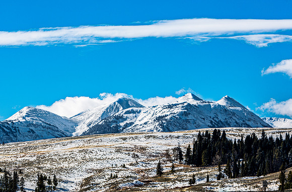 Snowy Mountains and Blue Sky