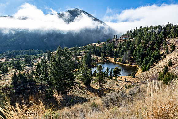 Mountain Landscape with Pond and Clouds