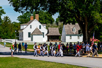 Colonial Drummers Marching in Historical Reenactment