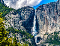 Majestic Waterfall Cascading Down Granite Cliff