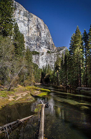 Majestic Granite Cliff and Serene River