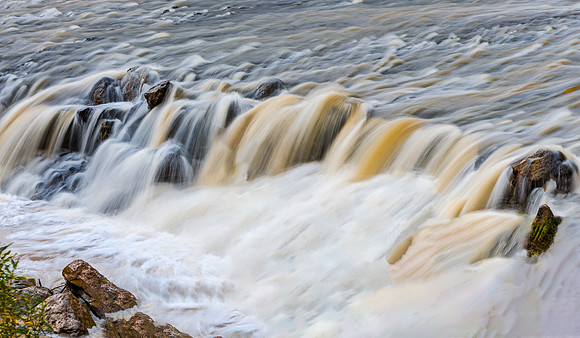 Rushing Waterfall Over Rocks