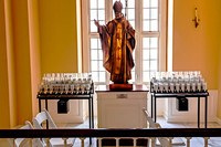 Pope John Paul II Statue and Prayer Candles