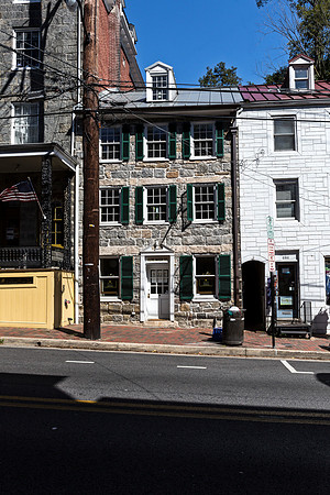 Historic Stone Building with Shutters