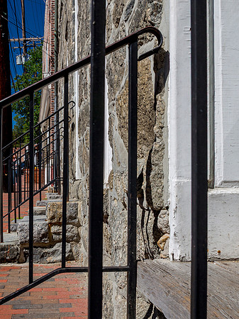 Stone Wall and Metal Railing