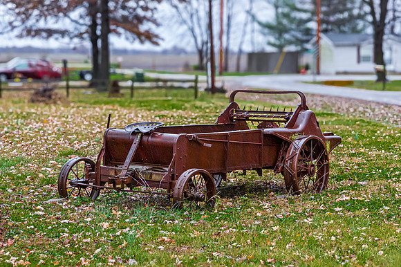 Vintage Manure Spreader in Field