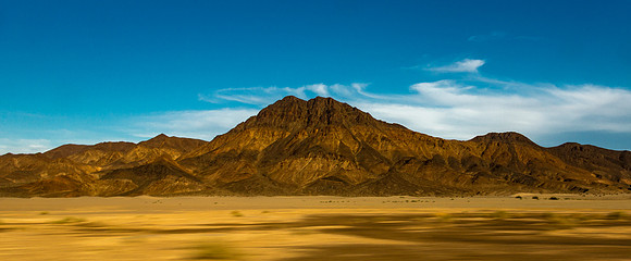 Desert Mountains Under Blue Sky